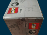 a box with a lego figure on it sitting on a table