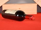 a bottle of wine that is sitting on a table