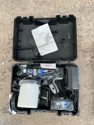 a tool kit in a plastic case on the ground