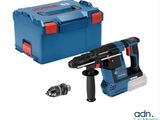marteau perforateur Bosch avec une boîte à outils et une perceuse
