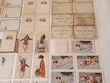 a lot of cards on the table with pictures on them