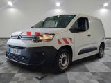 citroen van with red and white stripes parked in a large room