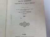 a close up of an open book on a table