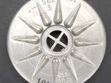 a silver wheel that has a number on it