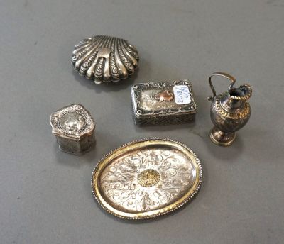 a lot of silver items that are on a table
