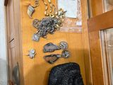 a display case with a lot of jewelry on it