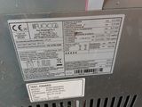 the back side of a furnace with a label on it