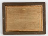 an old picture of a wooden frame on a white surface