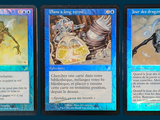 three cards with different designs are shown on a blue background
