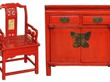 a red cabinet and a red chair next to each other