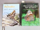 two books that are sitting on a table