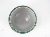 a bowl that is sitting on a white table