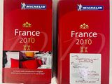 two books of michel michel ' s france 2010 on a table