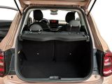 the back of a car with the trunk open and the seats folded down