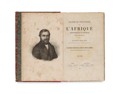 an old book with a picture of a man in a suit and tie