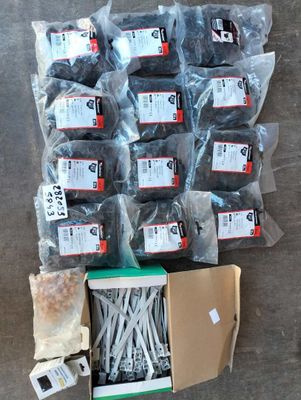 a box of assorted items sitting on the floor