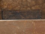 a close up of a piece of wood with a piece of wood sticking out of it