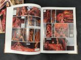 an open comic book with a picture of a woman in a red dress