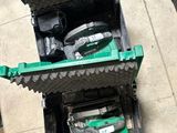 a green box with a green engine inside of it