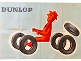 a poster of a man riding a motorcycle with tires on it