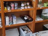 many boxes of food on the shelves in the store