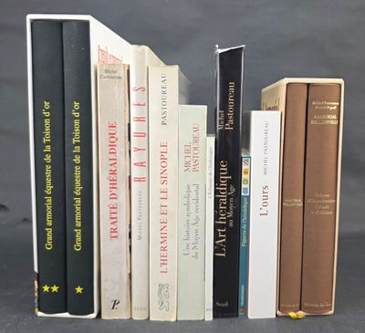 a lot of books that are sitting on a table