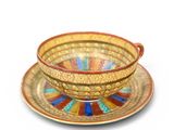 an image of a colorful cup and saucer on a white background
