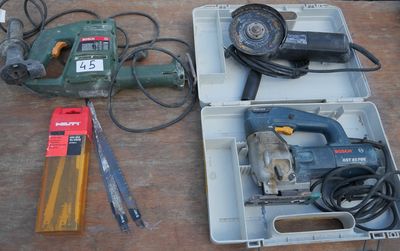 a box with tools on a table next to a tool box