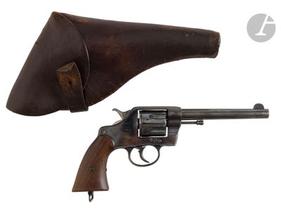 an old revolver with a leather case and a leather holster