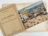 an open book with a picture of a beach and a town in the background