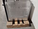 an image of a metal box on a pallet in a warehouse
