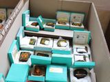 a box full of teas and other items sitting on a table