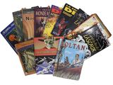 un grand nombre de livres posés sur une table