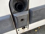 a close up of a door handle on a van
