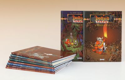 143/ DONJON ALBUMS de la série de bandes dessinées DONJON de…