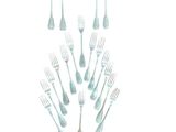 a lot of forks and spoons arranged in the shape of a heart