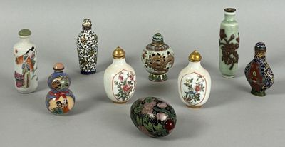 a lot of small vases that are sitting on a table