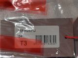 a bag of luggage that has a tag attached to it