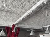 three lamps hanging from the ceiling in a room