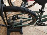 a bike that is sitting on a stand on the floor
