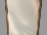 an image of a picture frame hanging on a wall in a room
