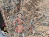 a picture of a tapestry hanging on a wall