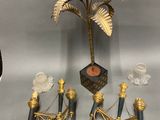 a small palm tree and other items that are on a table