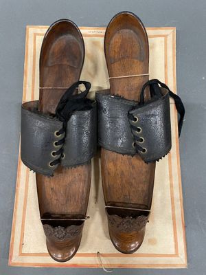 a pair of shoes that are sitting on a box