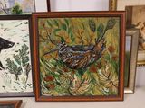 three framed pictures of birds and a bear in the grass