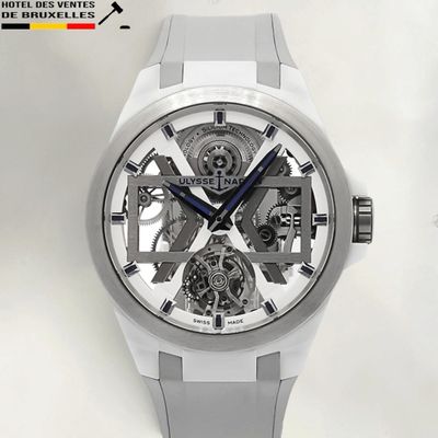 a close up of a watch with a white background