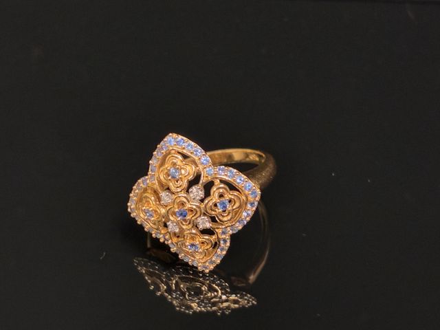 Bague en or 18 carats 750 millièmes le chaton quadrilobé à décor ...