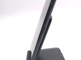 a cell phone that is sitting on top of a stand