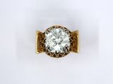 an image of a diamond ring on a white surface