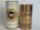 a canister and a canister of cigarettes sitting next to each other